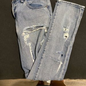 Distressed straight jeans